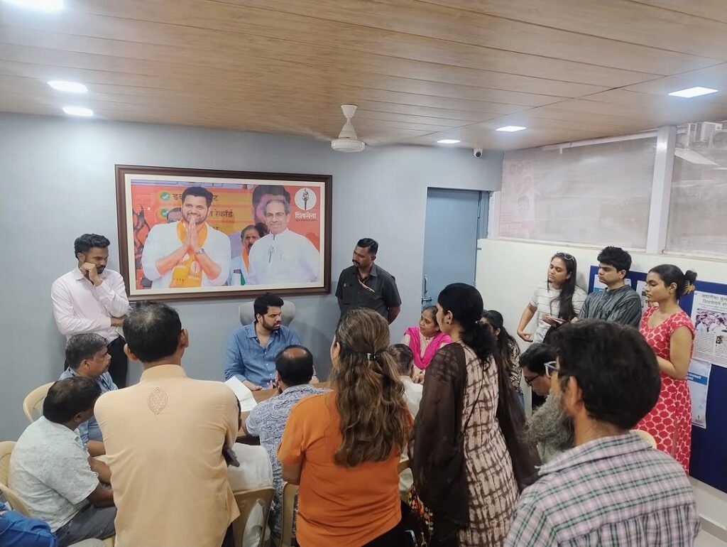Varun Sardesai engaging with constituents in a community meeting.